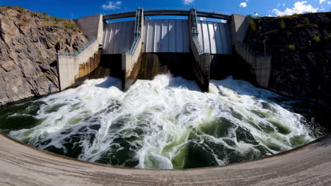 large hydroelectric dam with turbulent water release