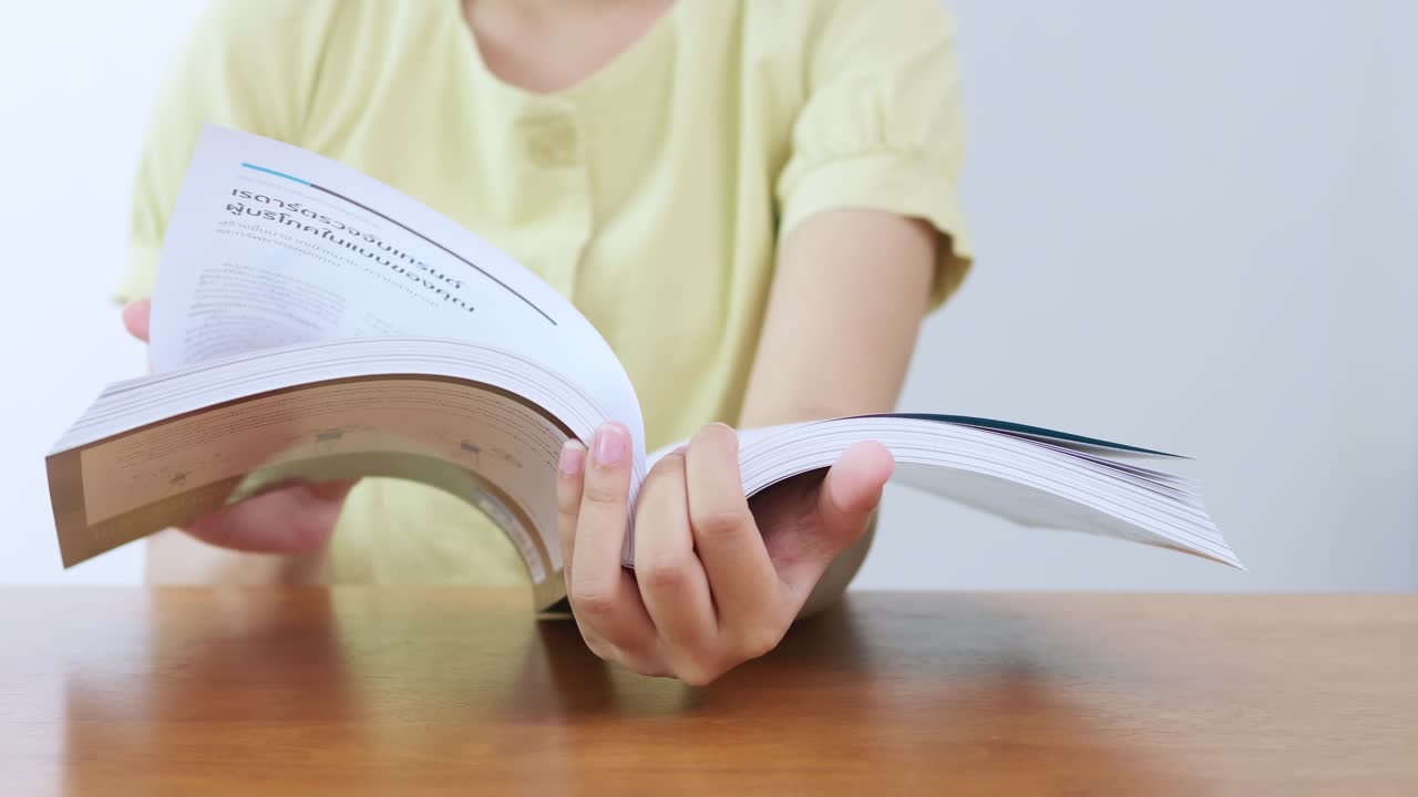A person enjoying the serenity of reading a bright cozy home atmosphere