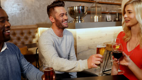 Group-of-friends-toasting-and-greeting-4K-4k