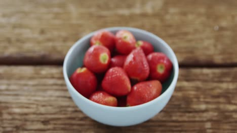 overhead of fresh strawberries in bowl