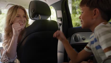 Video-of-mother-and-son-playing-paper-scissors-rock-decision-game