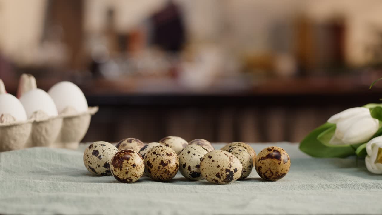 Happy Easter holiday. Quail eggs close-up. Preparing for Easter, painting and decorating eggs. Christian celebration, family traditions.