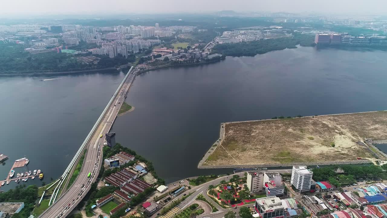 Aerial Birds Eye view of Singapore and Johor Straits from Malaysia