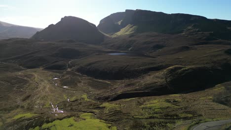 Pull-away-reveal-of-Loch-Cleat-and-Quiraing-rock-formations-at-the-Trotternish-Ridge-Isle-of-Skye-Scotland