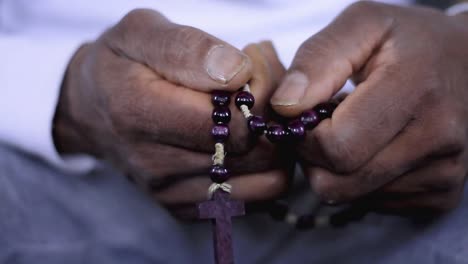 man-praying-to-god-with-hands-together-with-bible-Caribbean-man-praying-with-white-background-stock-footage