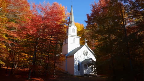 white church in autumn forest