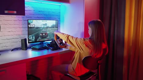 attractive woman playing videogames. professional gamer playing video games at home