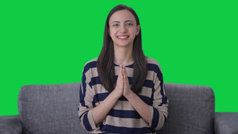 Happy-Indian-girl-doing-Namaste-Green-screen