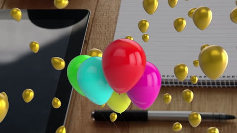 animación de globos sobre el portátil y la tableta