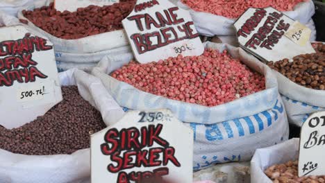 assortment of dried beans and seeds in a turkish market