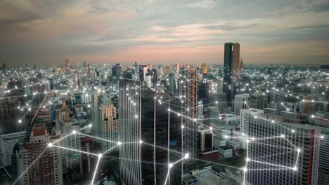 smart city network: aerial view of connected city at sunset
