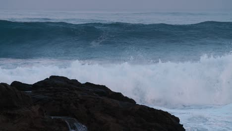 massive blue waves roll into the coast of hawaii in slow motion 3