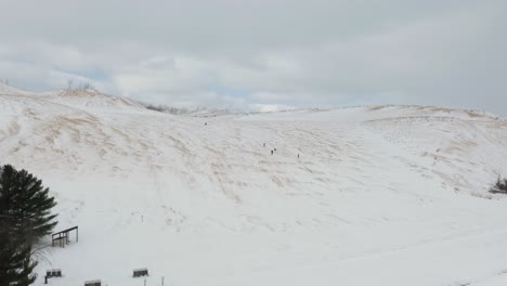 birds eye view of snow covered dunes at sleeping bear dunes in michigan