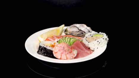 various sushi pieces displayed on rotating plate