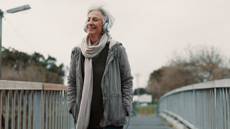 Old-woman,-thinking-with-headphones