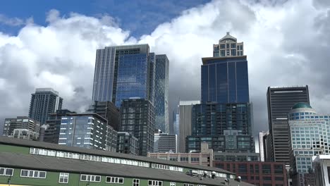 Downtown-Seattle,-Washington-waterfront-city-skyline-as-viewed-from-a-ferry-in-Elliott-Bay