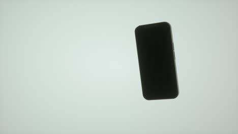 black screen phone model spinning around, animated graphic