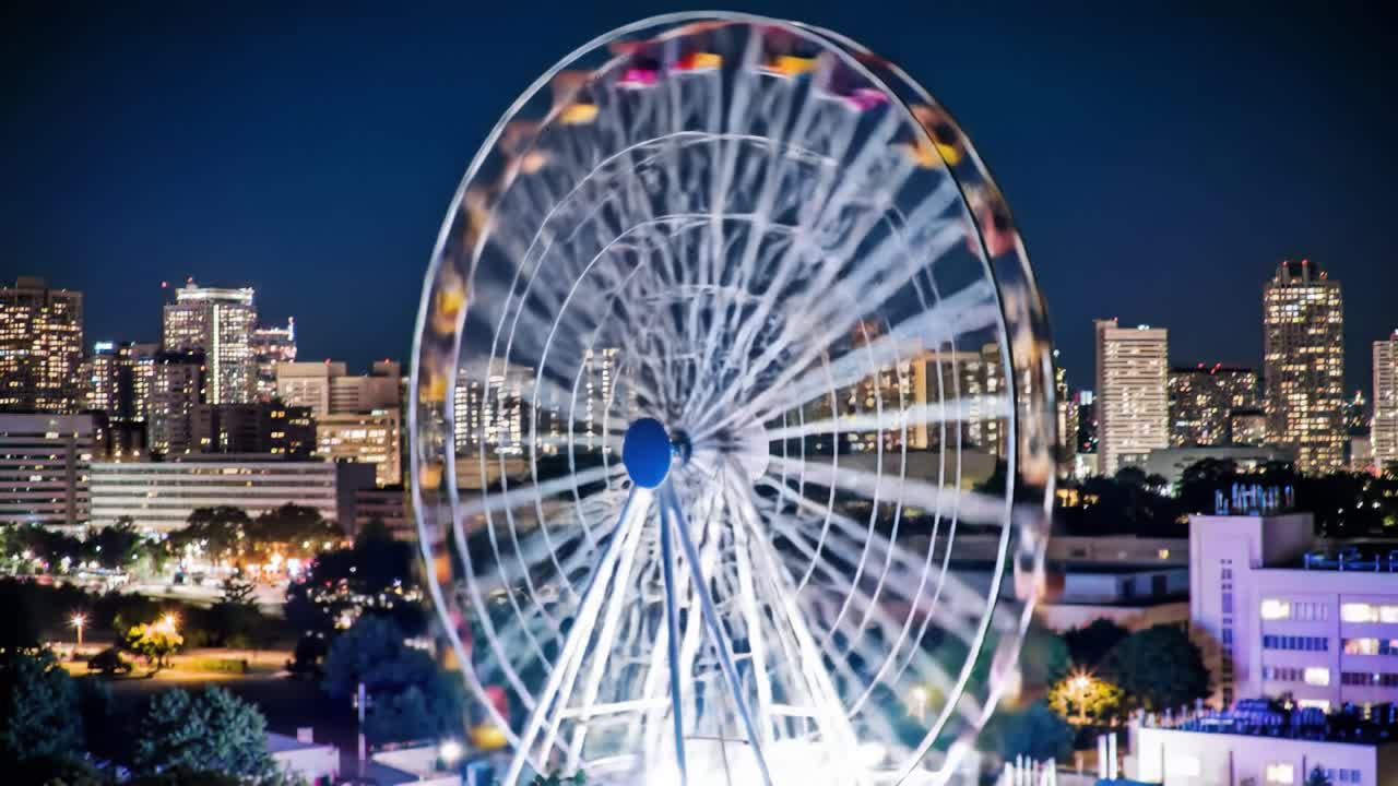 A Captivating Nightview of a Vibrant Ferris Wheel Against the Dazzling City Skyline, Illuminated by Endless Lights in a Colorful Display of Fun and Excitement