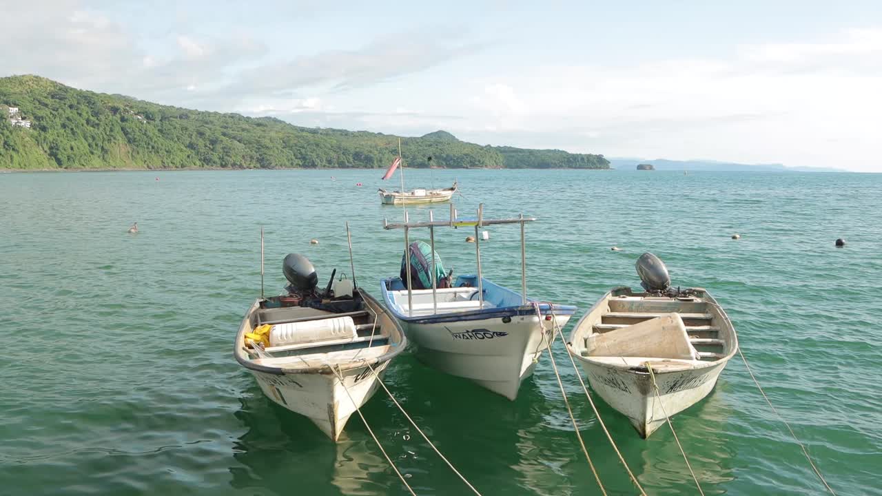 Boats on the sea that you hear fishing or an experience of God or life work on the Mexican coast and sea.