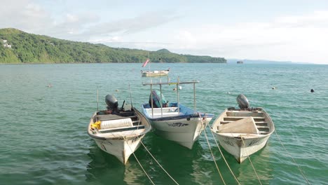 boats on the sea that you hear fishing or an experience of god or life work on the mexican coast and sea.