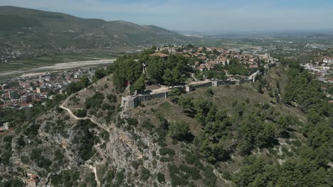 aerial circling shot of medieval castle in berat