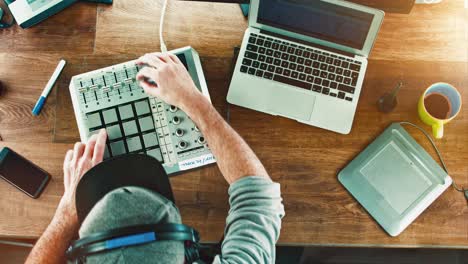 cinemagram: music producer / dj at his drum machine / mixer