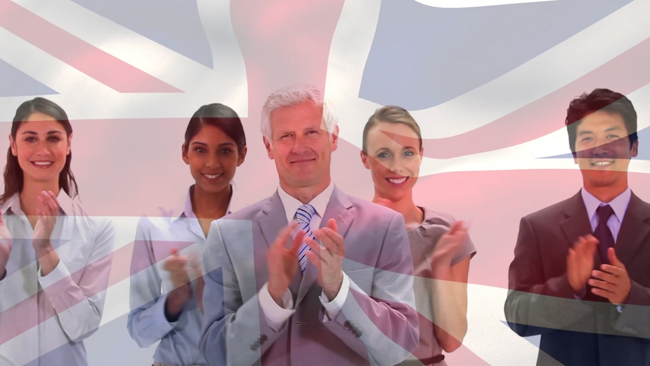Five business pros clapping after presentation, UK flag overlaying group pulsing
