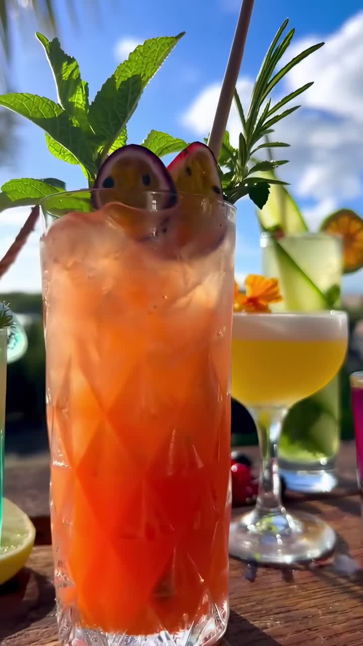 Vibrant cocktails on a sunny day, captured in a close-up angle, perfect for a tropical video