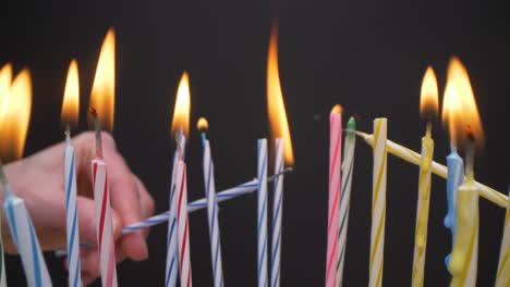 Slow motion close-up shot of birthday candles