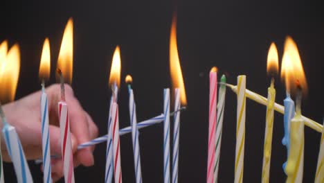 slow motion close-up shot of birthday candles