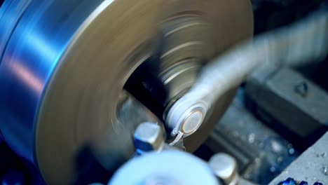 machine tool in metal factory. operating on drilling machine at metalworking industry