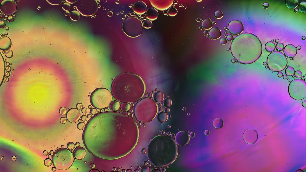 Abstract Colorful Food Oil Drops Bubbles and spheres Flowing