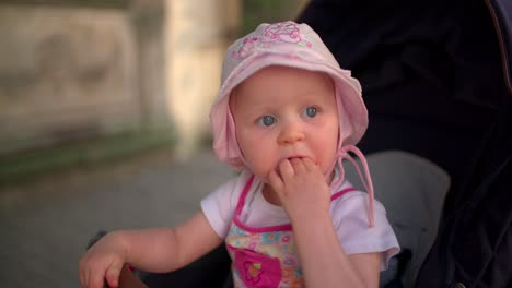 babygirl in stroller slow motion