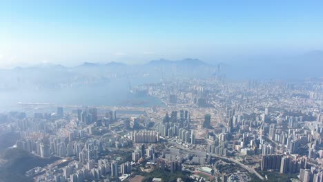 hong kong bay and skyline with skyscrapers, high altitude wide shot