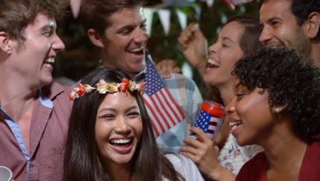 portrait of friends celebrating 4th of july with party