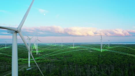 scenic aerial drone footage of environmental wind turbines in a forest near the sea. green renewable energy park with vfx augmented reality holograms shows internet of things online connectivity.