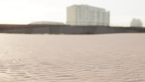 beach with buildings in the background