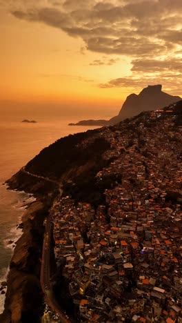 sunset over favela in rio de janeiro, brazil