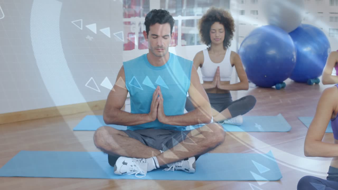 Central man holding prayer pose on guide cue while meditating in fitness, overlays sweeping mats