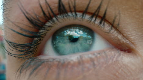 close up eye looking at nature outdoors seeing natural beauty macro iris healthy eyesight