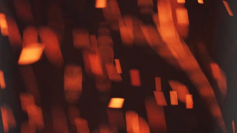 burning hot bonfire fire sparks on a dark background. flying particles and sparks from fire. abstraction