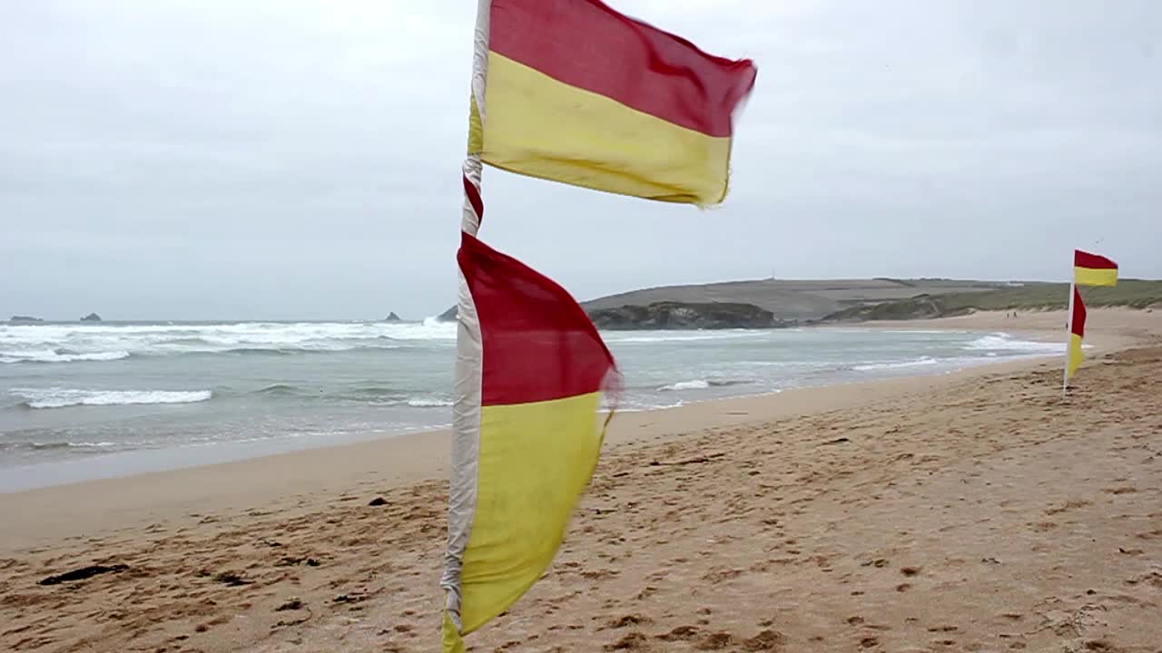 Beach with lifeguard flags