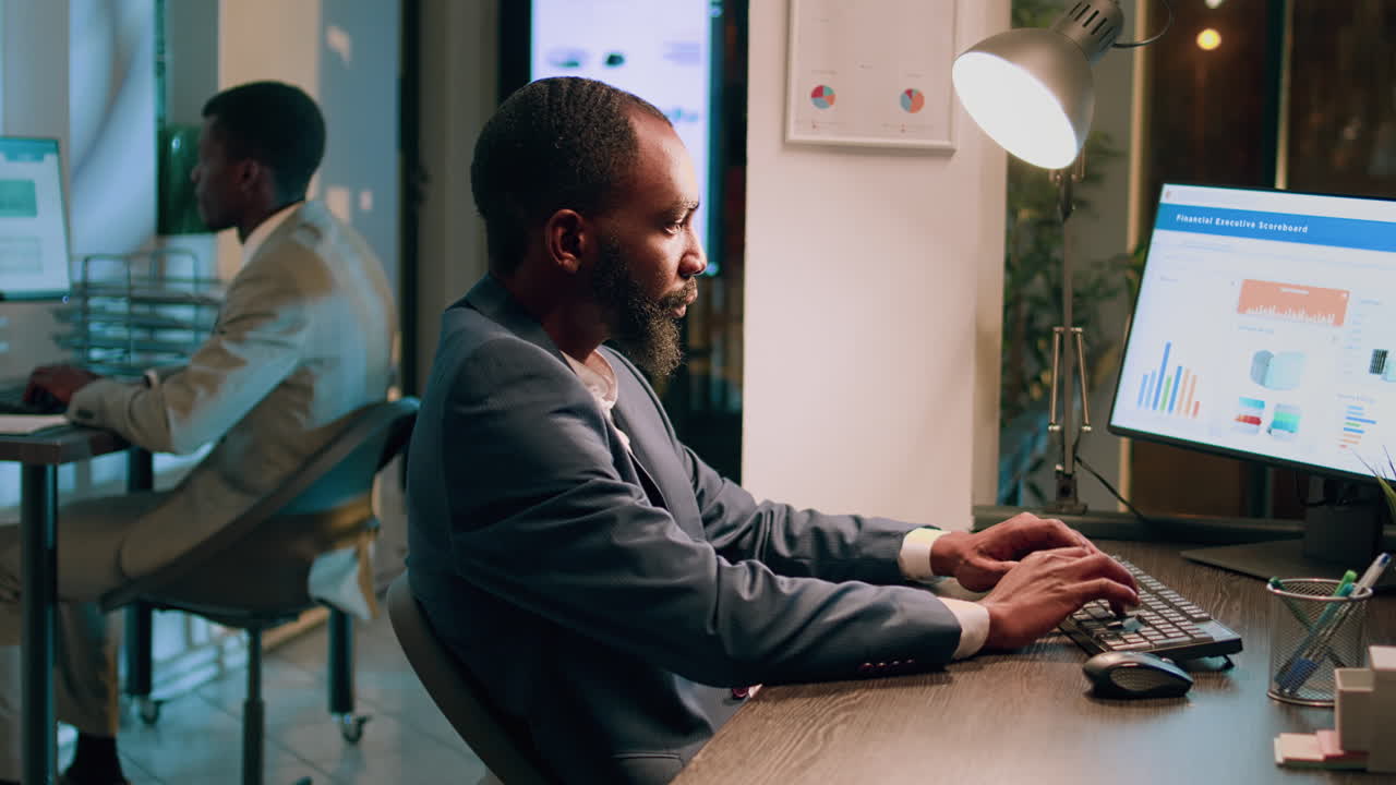 Businessmen working late in the office