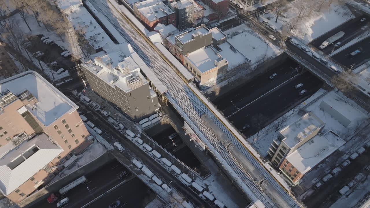 Aerial view of the New York City subway on a winter morning. Shot in Brooklyn.