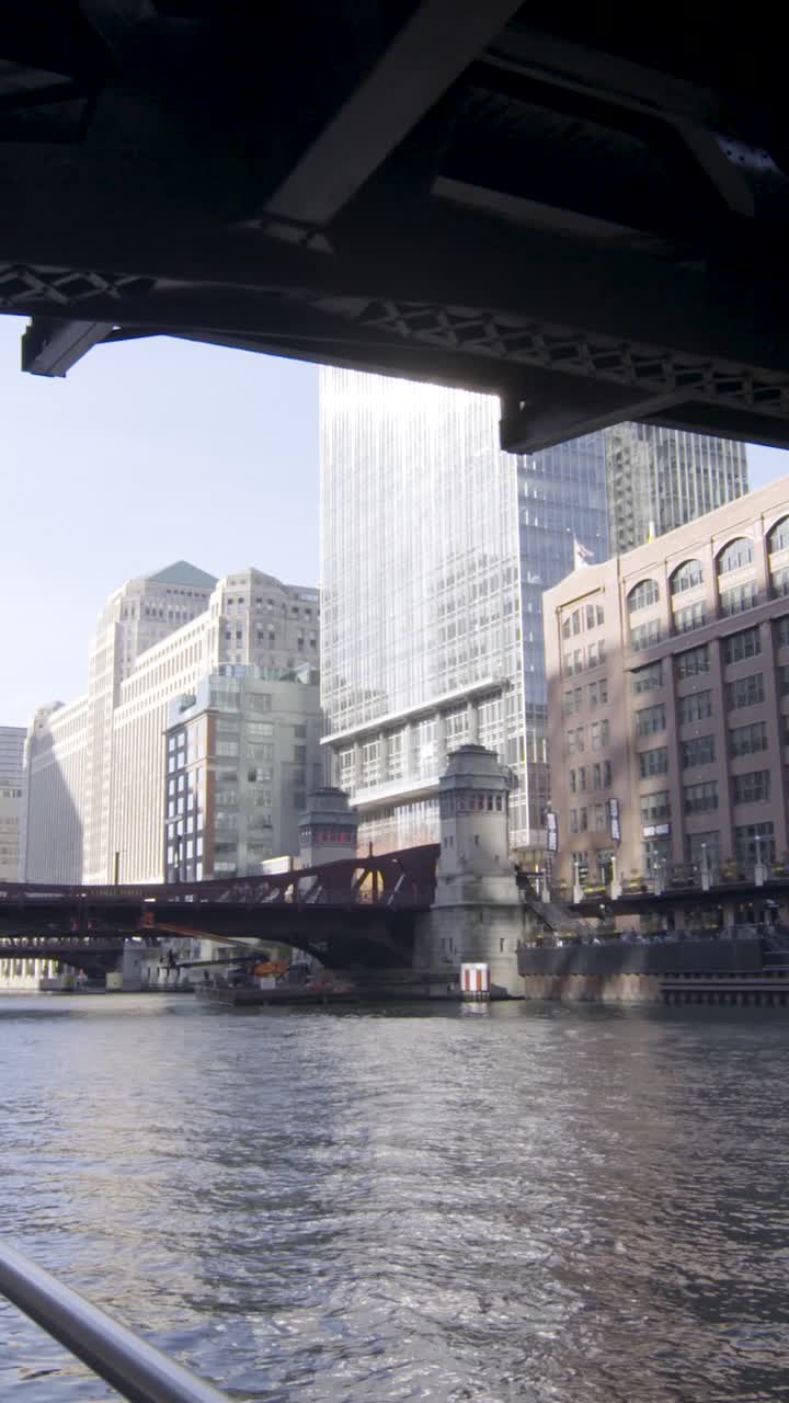 Scenic view of Chicago skyline from river, modern buildings, calm mood