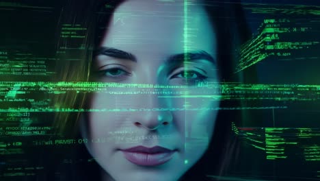 a woman's face is shown in a green screen with a black background. the woman's face is blurred and pixelated, giving the impression of a digital image. scene is somewhat eerie and unsettling
