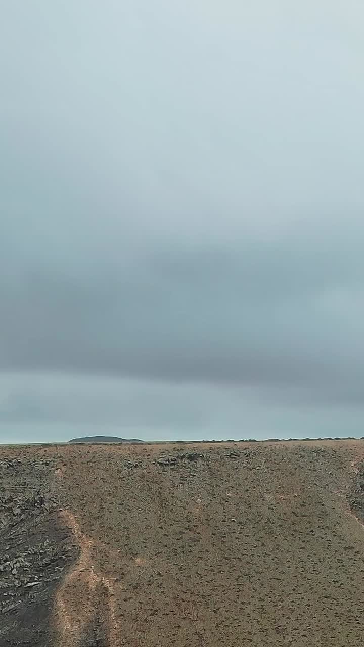 Volcanic Ridge Under Dramatic Sky in Canary Islands
