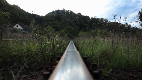 train track surrounded by grass 2