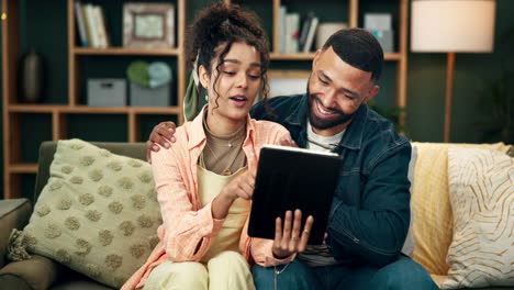 couple looking at tablet together
