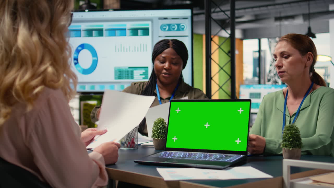 Vertical Video Team of ambitious businesswomen collaborates with copy space screen